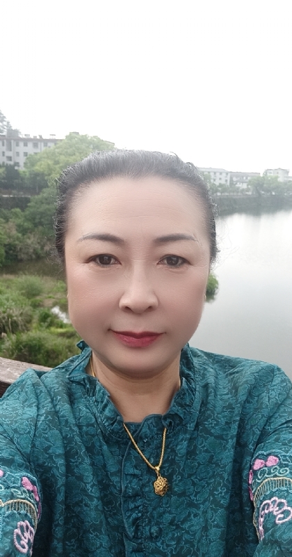 雨中情的第一张照片--石狮交友网